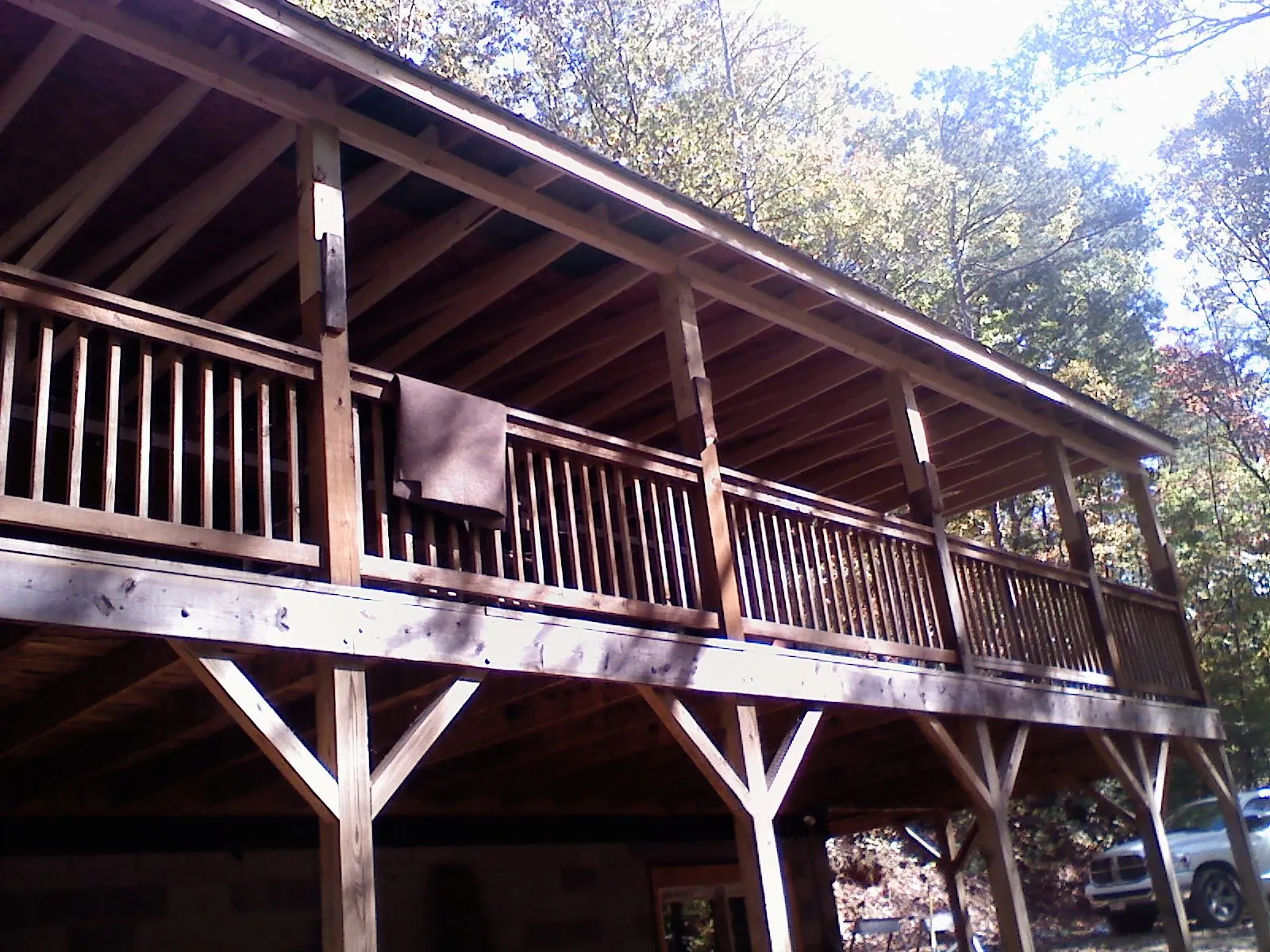 Timber framing under a new elevated porch and deck — Roof Leak Repair in Grundy Center by Roofing Brothers